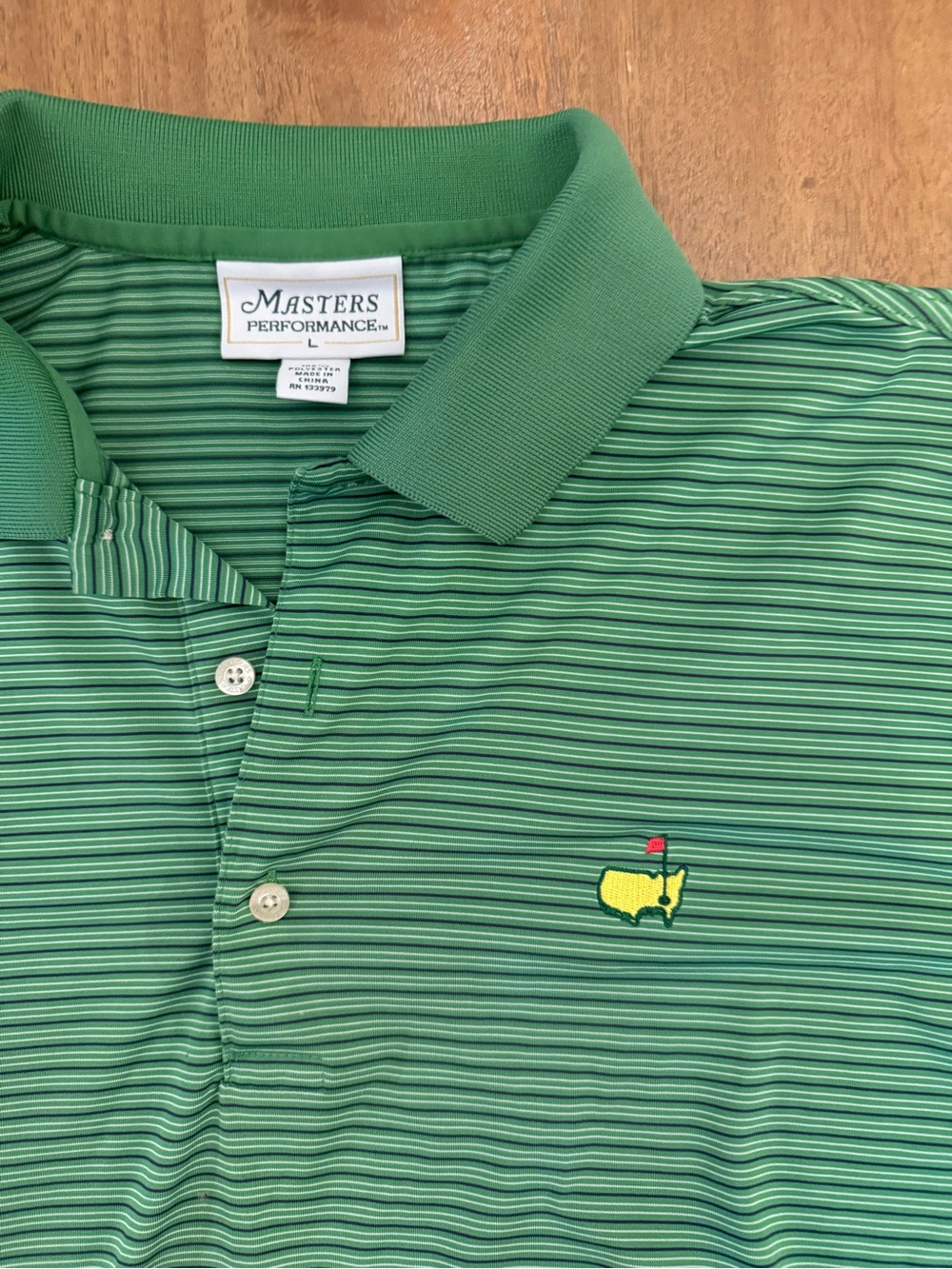 Masters Green Striped Performance Polo with Yellow & Red Logo